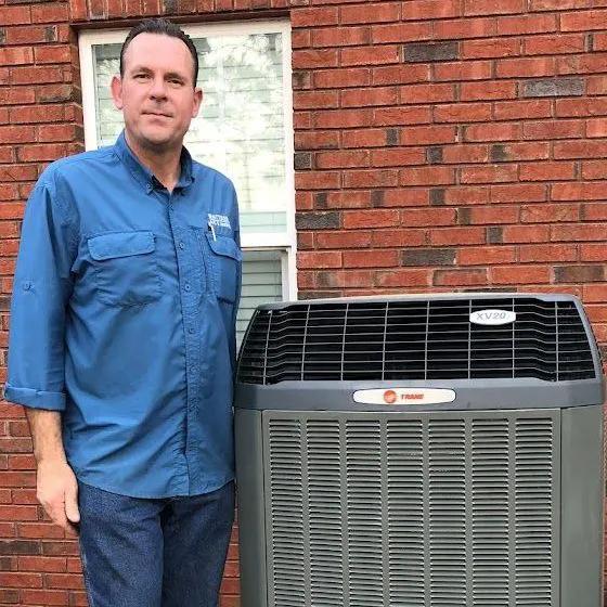 Whittiker AC owner standing with Trane XV20 unit in Little Rock Arkansas