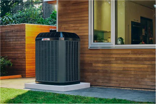 Trane residential AC unit installed beside modern home in Little Rock AR